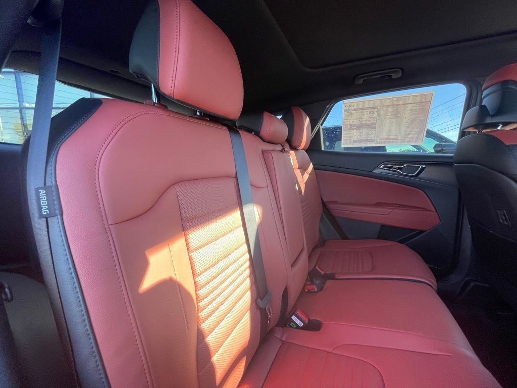 2026 Kia Sportage SX-Prestige - CARMINE RED INTERIOR COLOR PKG